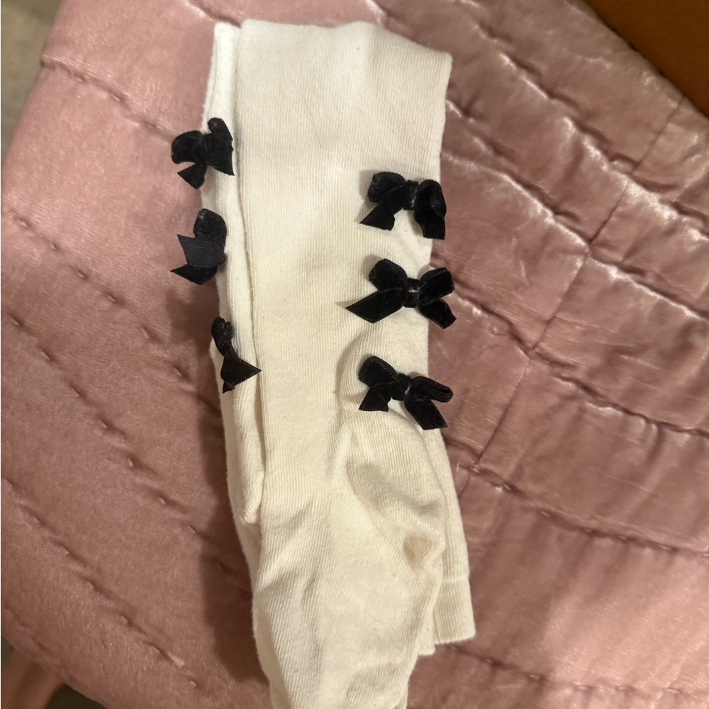 Janie and Jack White sweater tights with Black Bows